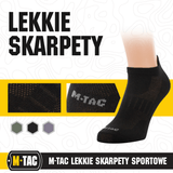 Musta M-Tac Let Sportsokker suunniteltu juoksuun, ergonomisilla painepisteillä ja hengittävällä materiaalilla, täydellinen ulkourheiluun.