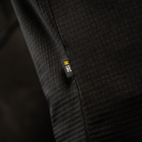 M-Tac Thermal Fleece Trøje Delta Level 2 yksityiskohta merkistä, suunniteltu kylmään ilmastoon 100% polyesteristä YKK-vetoketjuilla.