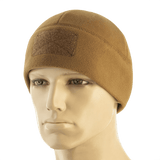M-Tac Watch Cap Elite Fleece Beanie Hat Velcro, lämmin fleece ja Velcro-paneeli mannekiinilla.