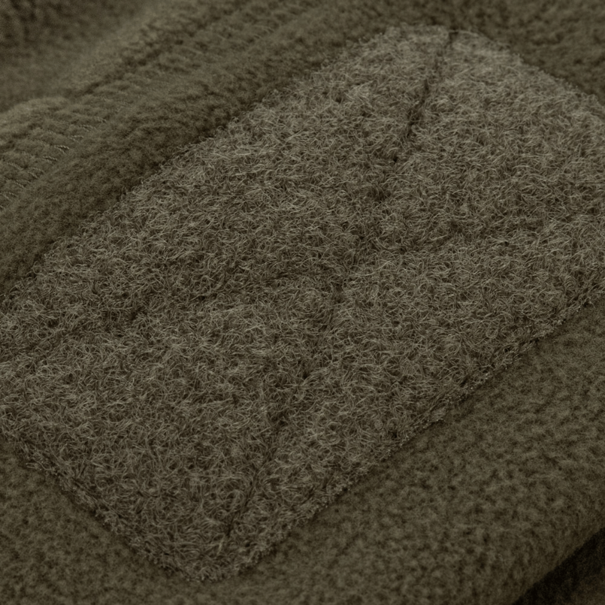 M-Tac Watch Cap Elite Fleece Beanie Hat Velcro, yksityiskohta fleecen rakenteesta ja Velcro-paneelista, täydellinen taktiseen ja kylmään säähän.