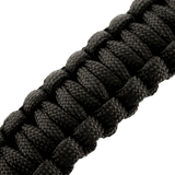 M-Tac Paracord-rannekoru sytyttimellä, kompassilla ja pillillä, musta tiiviisti kudottu malli selviytymiseen ja ulkoiluun.